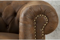 Fauteuil design chesterfield teinté marron