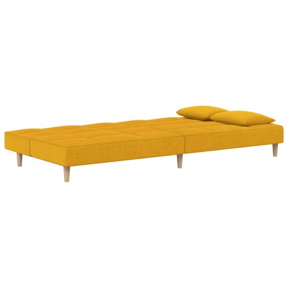 Canapé-lit à 2 places avec deux oreillers jaune tissu