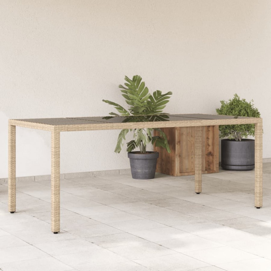 Table de jardin avec dessus en verre beige résine tressée