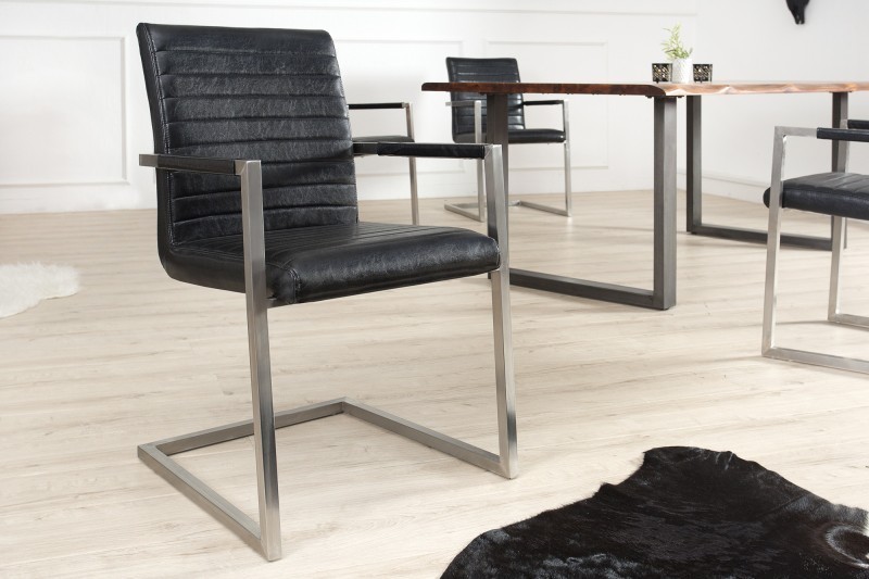 Lot de 4 chaises designe en simili cuir noir et métal