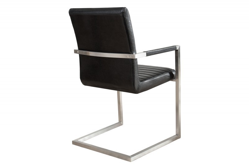 Lot de 4 chaises designe en simili cuir noir et métal