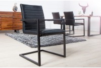 Lot de 4 chaises alliant simili cuir noir laqué et acier inoxydable