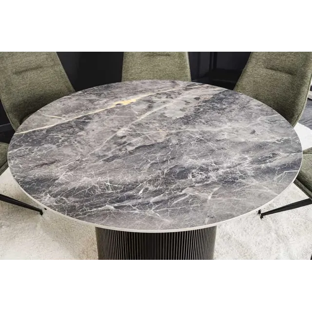 Table à manger ronde UNIQUE Ø120 cm – Plateau en céramique noire effet marbre & pied colonne Table à manger ronde UNIQUE Ø120 cm – Plateau en céramique noire effet marbre & pied colonne