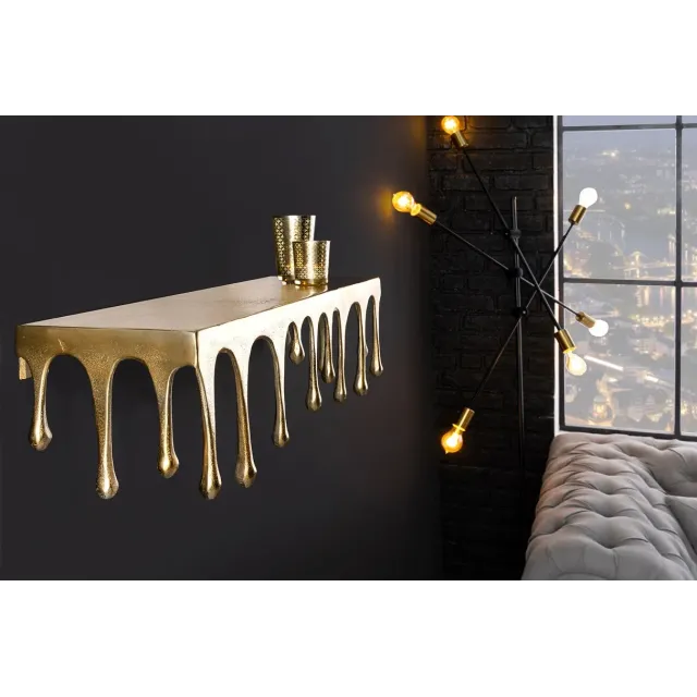 Étagère murale LIQUID LINE 60 cm – Métal doré antique, design sculptural façon goutte, fabrication artisanale Étagère murale LIQUID LINE 60 cm – Métal doré antique, design sculptural façon goutte, fabrication artisanale