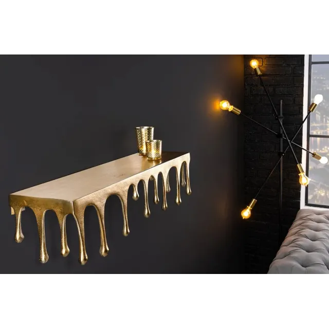 Étagère murale LIQUID LINE 60 cm – Métal doré antique, design sculptural façon goutte, fabrication artisanale Étagère murale LIQUID LINE 60 cm – Métal doré antique, design sculptural façon goutte, fabrication artisanale