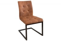 Chaise cantilever style capitonné coloris cognac