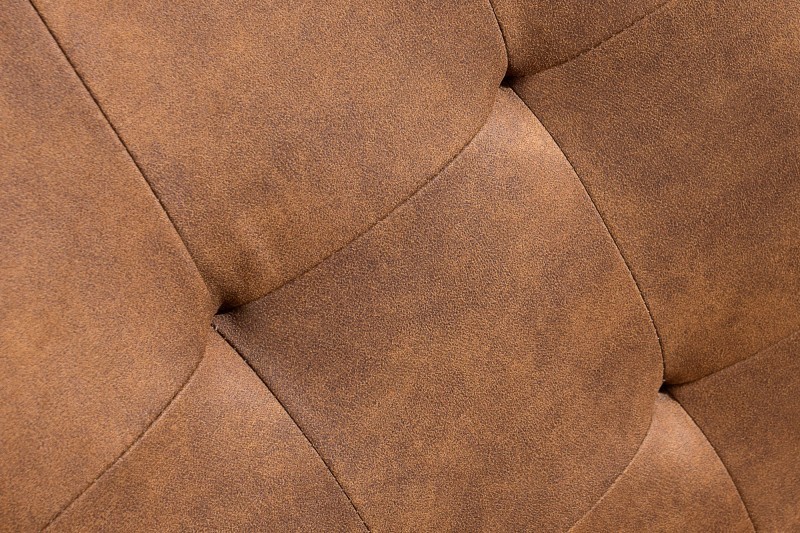 Chaise cantilever style capitonné coloris cognac