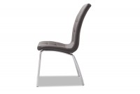 Chaise design en simili cuir coloris gris