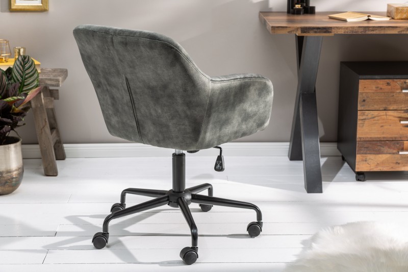 Chaise de bureau en velours coloris  verte avec un dossier capitonné