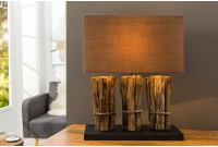 Lampe à poser design en bois flotté coloris brun avec une base noir