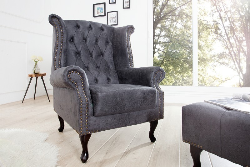 Fauteuil design Chesterfield coloris gris capitonné