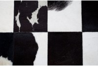 Tapis style patchwork en vraie fourrure teinté noir et blanc