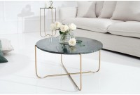 Table basse design en marbre coloris vert avec piétement en métal doré